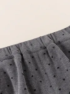 Pantalon en tricot gris foncé pour filles avec motif cœur et taille élastiquée