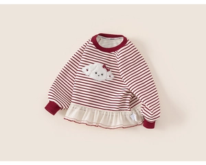 Detail of red striped toddler sweatshirt with plush puppy embroidery and mesh ruffle hem