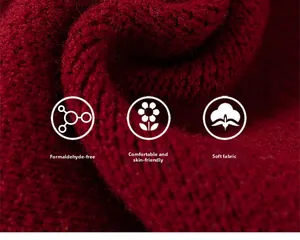 Detail of red knit fabric texture showing soft wool blend and skin-friendly quality
