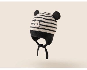 Detail of baby knit hat featuring striped panda design with cute 3D ears and earflaps