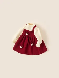 Elegant red knit girls' dress set with cream turtleneck and bow bear details for winter
