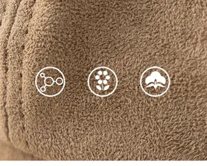 Close-up of brown plush fabric with soft texture and parallel stitching details