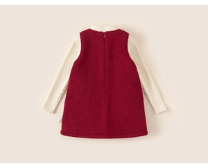 Detailed view of dark red tweed girls' winter dress with back invisible zipper
