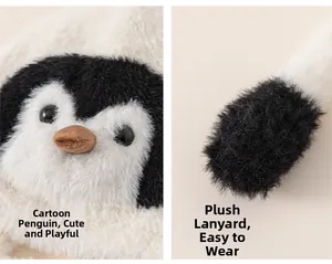 Detail of plush penguin hat for kids featuring soft faux fur and secure tie straps