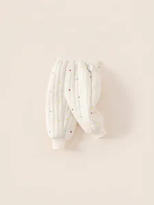 Pantalon matelassé beige pour enfant avec broderies cœurs et doublure polaire chaude