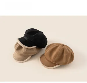 Three colors of suede beret hats with faux fur trim and metal logo detail