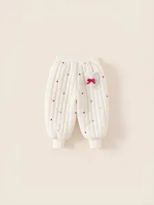 Pantalon matelassé pour petite fille blanc crème avec broderie cœur et poche en peluche