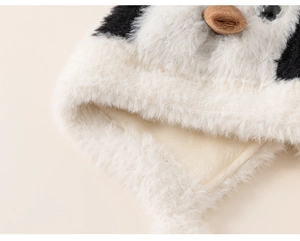 Detailed close-up of thick plush penguin hat with soft lining and faux fur texture