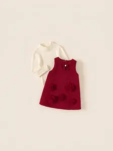 Girls' winter two-piece set featuring a beige knitted sweater and a red tweed floral dress