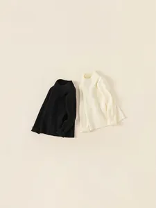 Kids ribbed knit mock neck sweater set in black and cream beige soft fabric