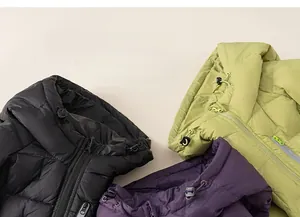 Detailed close-up showing the multi-color quilted down jackets with adjustable drawstring hoods