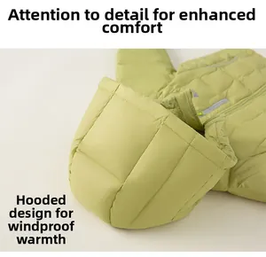 Detail of children hooded down jacket showing quilted windproof hood and soft fabric texture