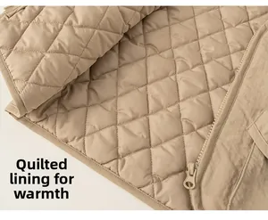 Detail view of quilted lining with khaki diamond stitching for warm winter vest