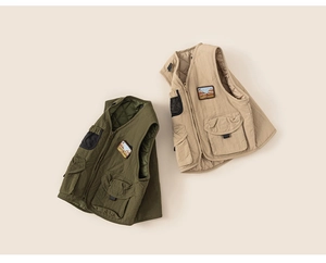 Detail of olive green and khaki utility vests with multi-pockets and quilted lining
