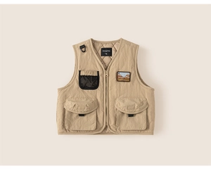 Detail of khaki utility vest showing multi-pocket design and quilted warm lining texture