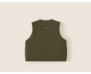 Back view of thick olive green padded vest with stitched logo label and outdoor fabric texture