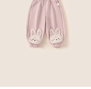 Detail of pink toddler joggers with elastic waistband and cute 3D bunny plush patches