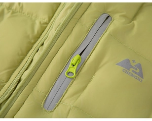 Detail of lime green quilted down jacket showing zipper pocket and embroidered logo