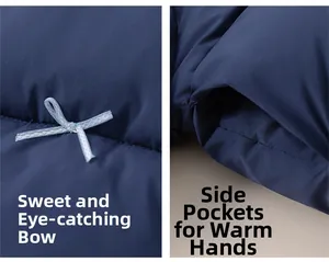 Detail of dark blue kids' puffer jacket showing bow decoration and side pocket stitching