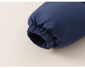 Detail of elastic windproof cuffs on navy blue winter jacket for little girls