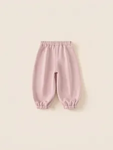 Pink fleece lined thermal jogger pants for girls with soft warm fabric and elastic waist
