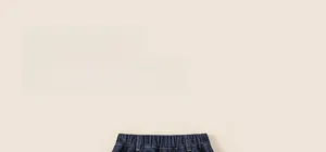 Detail of elastic waistband and belt loops on these kids thick dark blue denim jeans