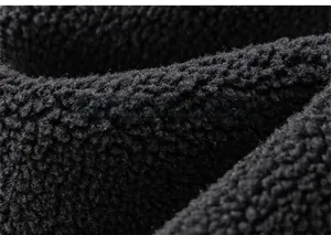 Close-up of thick black lamb velvet lining showing soft texture of kids jeans