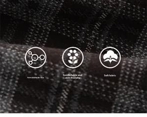 Gros plan du tissu écossais épais montrant une texture douce en laine pour pantalons