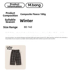 Détail du pantalon d'hiver à carreaux marron avec doublure polaire et étiquette de soin