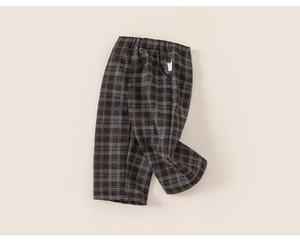 Vue détaillée du pantalon à carreaux épais pour enfants avec taille élastique hiver