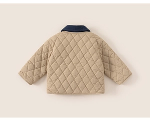 Rear view of kid's quilted jacket with diamond patterns and contrast navy collar
