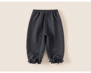Détails du pantalon à carreaux pour enfants avec taille élastique et volants