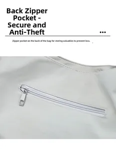 Detail of light gray tote bag with a secure back hidden zipper pocket and metal slider