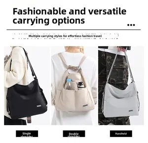 Detail of large capacity tote bag featuring external side pockets for water bottle and umbrella