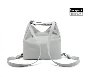 Detail view of the backpack back featuring adjustable straps and anti-theft zipper pocket