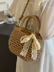 Sac à main en paille style français avec nœud en dentelle et chaîne dorée pour plage