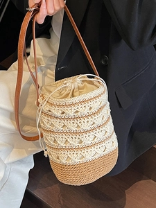 Bohemian style crochet bucket bag with cream and light coffee pattern and leather strap