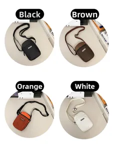Detailed view of casual mini crossbody bags in black, brown, orange and white colors