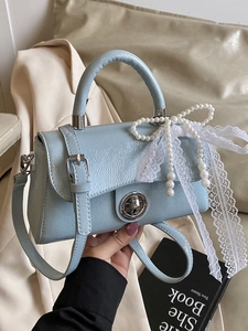 Chic light blue textured leather square handbag with pearl bow and lace ribbon detail