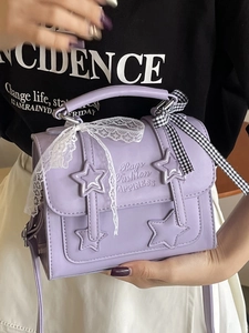 Sweet purple star patterned small handbag with lace bow detail and shoulder strap