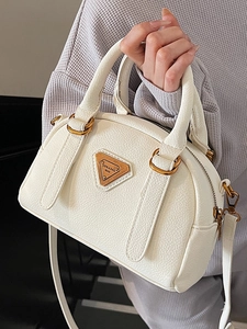 Minimalist beige lychee texture Boston handbag with golden plaque and crossbody strap