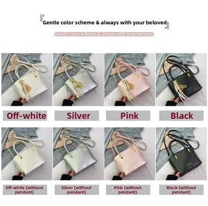 Detail view of stylish PU leather bucket bags in white, silver, pink and black colors