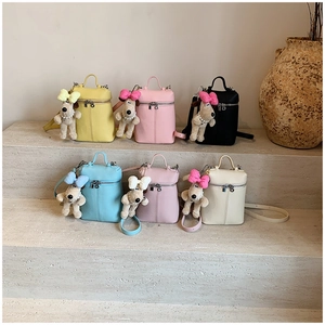 Litchi texture mini crossbody bags in various colors with cute plush puppy charms