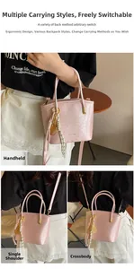 Detail of pink bucket bag with gold hardware and creative tennis racket charm accessory