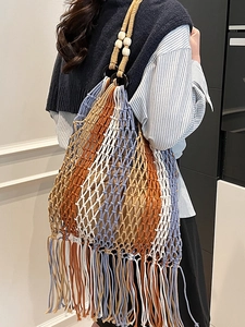 Bohemian hand-woven tote bag with colorful mesh, wooden beads, and long tassels