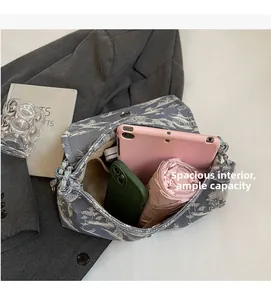 Macro view of the spacious interior with zippered pocket for storage and organization