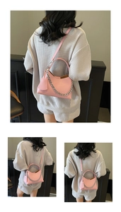 Pink bucket bag with textured leather, silver chain detail and small matching pouch