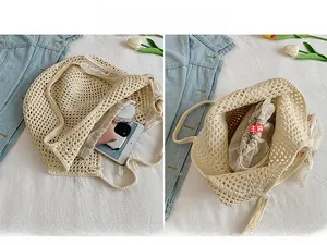 Detail of woven tote bag interior showing large capacity for phone, tablet, and cosmetics