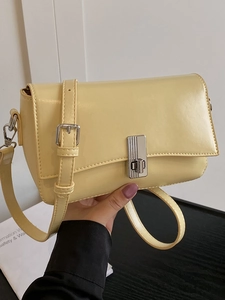 Chic pale yellow oil-waxed leather crossbody bag with silver buckle for women