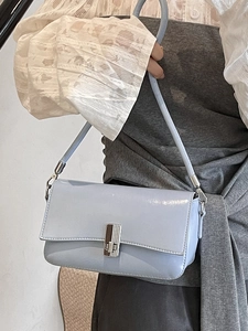 Light blue glossy oil-wax leather shoulder bag for women with silver metal buckle closure